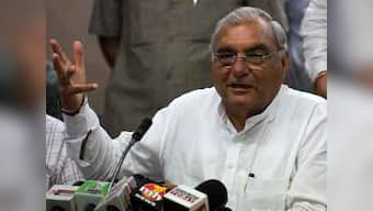 Booing of Cong CMs: Modi extends olive branch, invites Hooda to tea