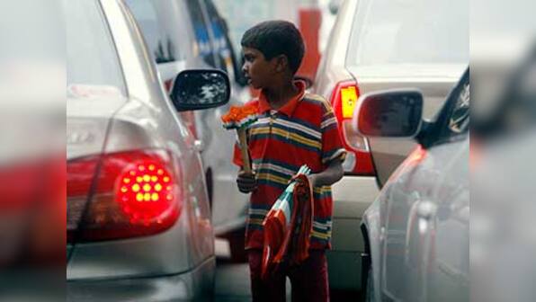 The urchin at the traffic light: An unexpected postcard from #FreeIndia