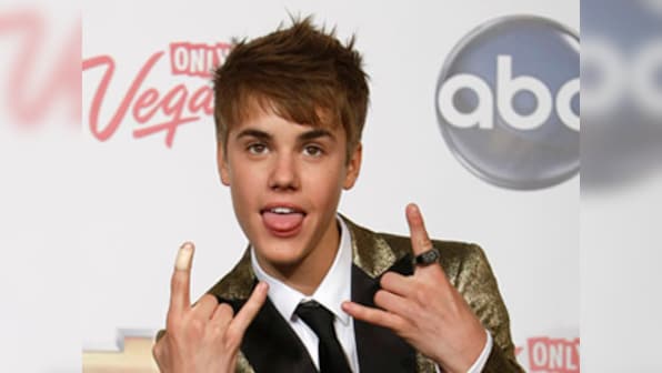 Beiber, bodyguard sued by photographer over tiff in Hawaii