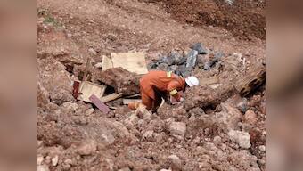 China: 6 dead, 21 missing in landslide 