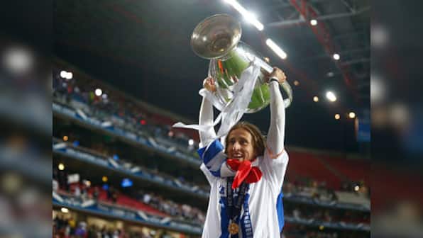 Modric commits to Real with new four-year deal