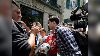 Suarez biting bans upheld but he can train with Barca