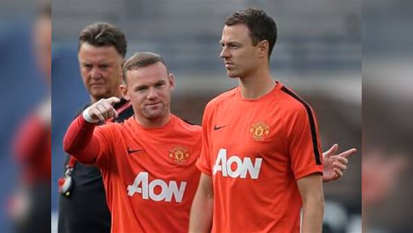 Manchester United defender Evans denies FA spitting charge