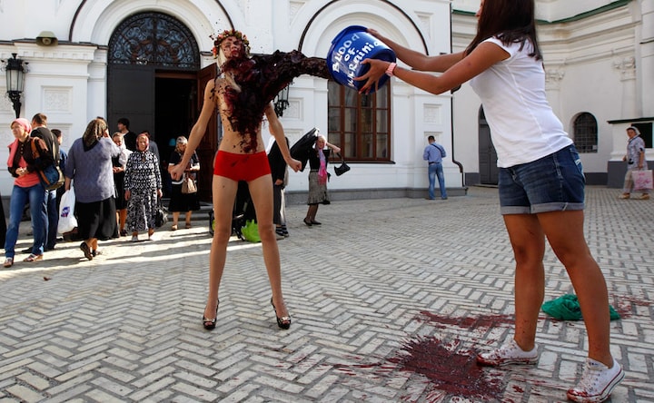 Photos: Activists of Ukrainian womens' rights group stage topless protest