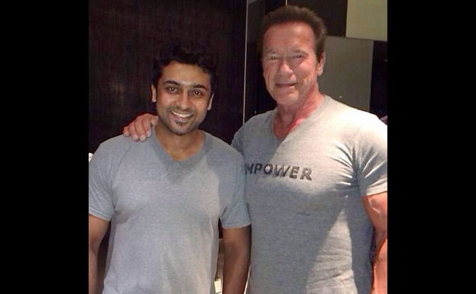 Chennai: Hollywood actor Arnold Schwarzenegger with actor Suriya at a gym in Chennai on Monday. PTI