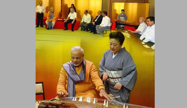 Kimono lady and musical instrument. Modi's Facebook Fan page
