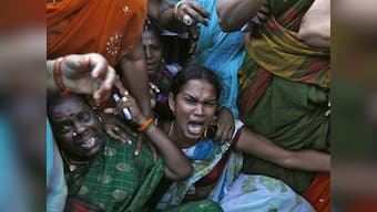 Bus torched, sporadic violence continues in TN