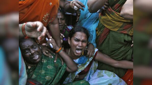 Bus torched, sporadic violence continues in TN