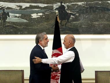 Abdullah Abdullah (left) and Ashraf Ghani Ahmadzai (right). AP