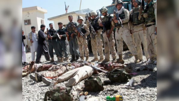 Taliban offensive kills 100 Afghans; 12 beheaded as violence spirals