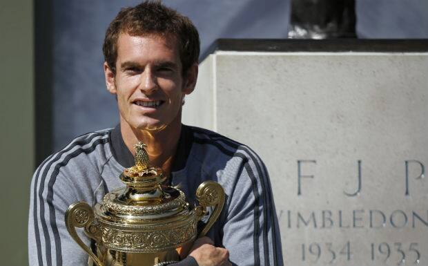 Andy Murray with Wimbledon trophy. Reuters 