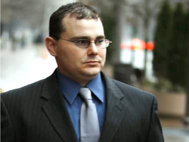 File photo of Blackwater Worldwide security guard Dustin Heard. AP image