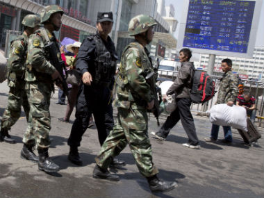 China: Forty 'rioters' killed in Xinjiang after a series of explosions China: Forty 'rioters' killed in Xinjiang after a series of explosions