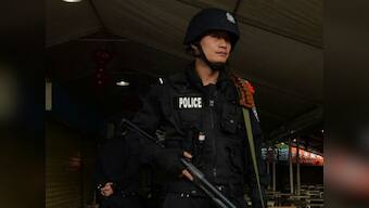 Knife-wielding woman injures 14 children at western China kindergarten; attacker arrested, motive unclear