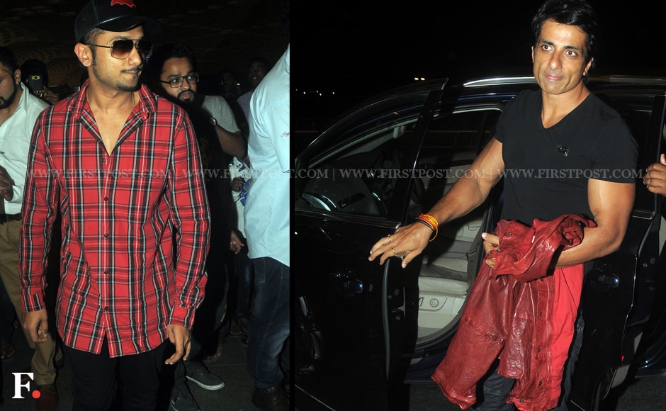 The cast of 'Happy New Year' was seen at the Andheri airport on Wednesday early morning, leaving to the US for their mega Bollywood show, The Slam Tour. They will touring six venues in a span of two weeks. Yo Yo Honey Singh (L) and Sonu Sood are seen here. Sachin Gokhale/Firstpost The cast of 'Happy New Year' was seen at the Andheri airport on Wednesday early morning, leaving to the US for their mega Bollywood show, The Slam Tour. They will touring six venues in a span of two weeks. Yo Yo Honey Singh (L) and Sonu Sood are seen here. Sachin Gokhale/Firstpost