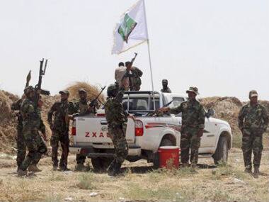 Victorious Iraqi forces are seen in this photo. AP 