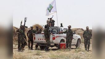 Jubilant Iraqi forces break two-month ISIL siege of northern town