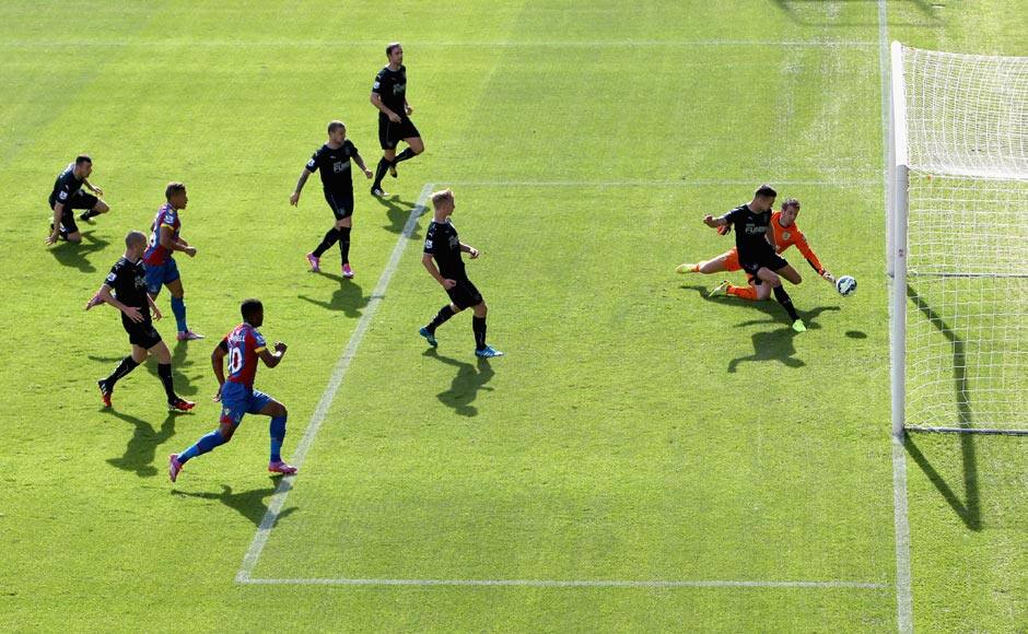 Jason Shackell of Burnley makes a clearance off the line after a shot by Wilfried Zaha of Crystal Palace during the Barclays Premier League match between Crystal Palace and Burnley at Selhurst Park. The match ended in a 0-0 draw. Getty Images
