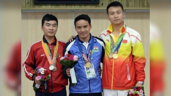 Jitu Rai gives India golden start on opening day of 2014 Asian Games