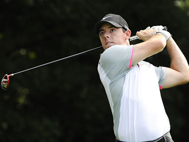 Bang on target: Rory McIlroy's tee shot lands in spectator's pocket Bang on target: Rory McIlroy's tee shot lands in spectator's pocket