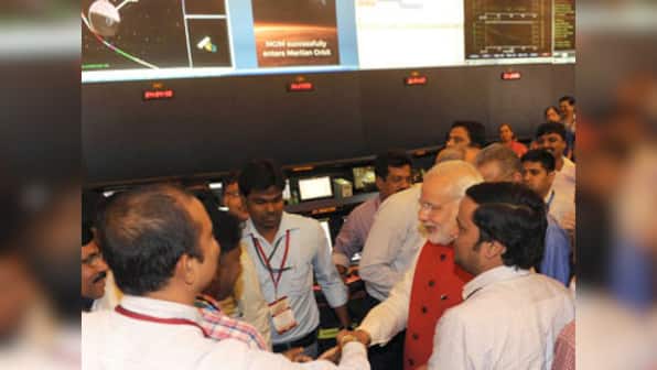 ISRO scientists present first Mangalyaan pictures of Mars to Modi