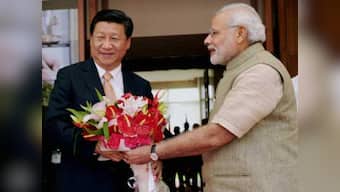  India, China sign three pacts within hours of Xi's arrival