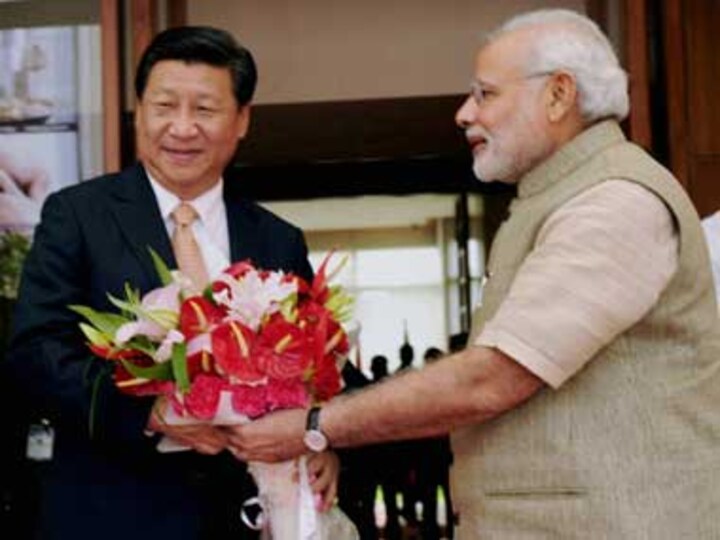  India, China sign three pacts within hours of Xi's arrival