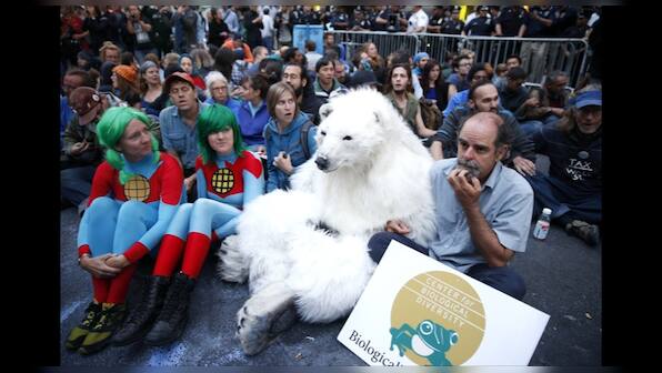 Protesters occupy Wall Street against effects of capitalism on environment