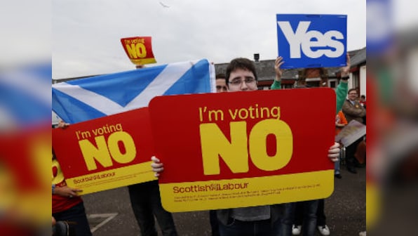 Britain pledges state funding to Scotland as referendum day dawns