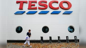 Tesco cuts profit forecast for third time this year, suspends staff after accounting error