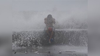 Flooded residents on rooftops as typhoon Koppu pummels Philippines