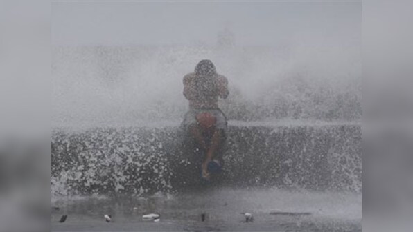 Flooded residents on rooftops as typhoon Koppu pummels Philippines