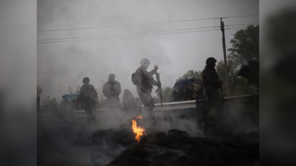 French, German leaders try to save faltering Ukraine truce 