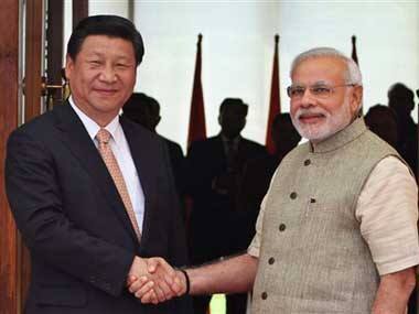 Xi and Modi are all sweetness and light on the outside: Associated Press