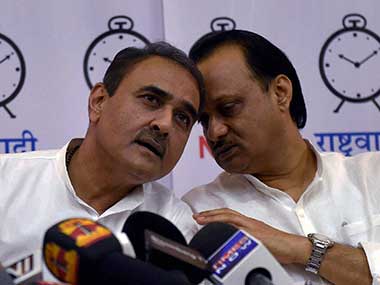 NCP leader Praful Patel and Ajit Pawar at a press conference announcing the end of their alliance with Congress. PTI
