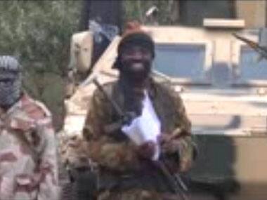 An image grab of a video posted by Boko Haram which shows the man claiming to be the terror group's head, Abubakar Shekau