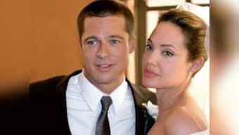 Angelina Jolie walked down the aisle to Brad Pitt's humming 