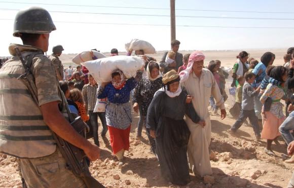 About 60,000 Syrian Kurds flee to Turkey from Islamic State advance About 60,000 Syrian Kurds flee to Turkey from Islamic State advance