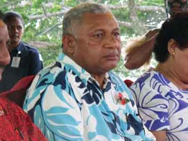 Former military leader sworn in as Fiji prime minister Former military leader sworn in as Fiji prime minister