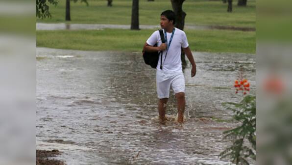 Philippines floods: Thousands flee Manila, one dead