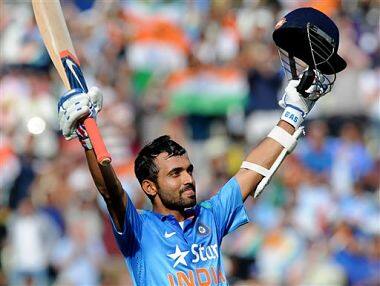 India's Ajinkya Rahane celebrates scoring a century against England during the fourth ODI. AP