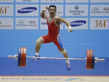 North Korean pocket rocket Om Yun Chol breaks weightlifting world record North Korean pocket rocket Om Yun Chol breaks weightlifting world record