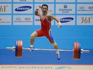 North Korean pocket rocket Om Yun Chol breaks weightlifting world record