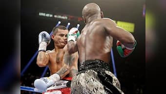 Mayweather remains unbeaten with decision win 