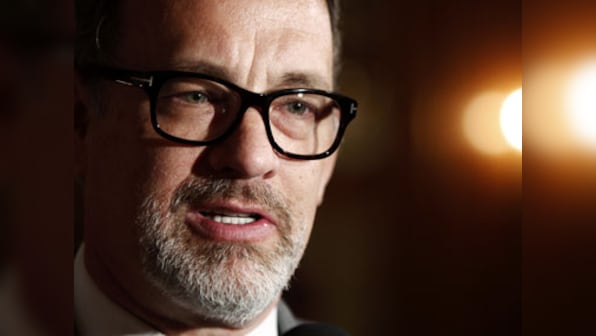Tom Hanks says he'd love to star in a James Bond movie, but hasn't been approached for a role
