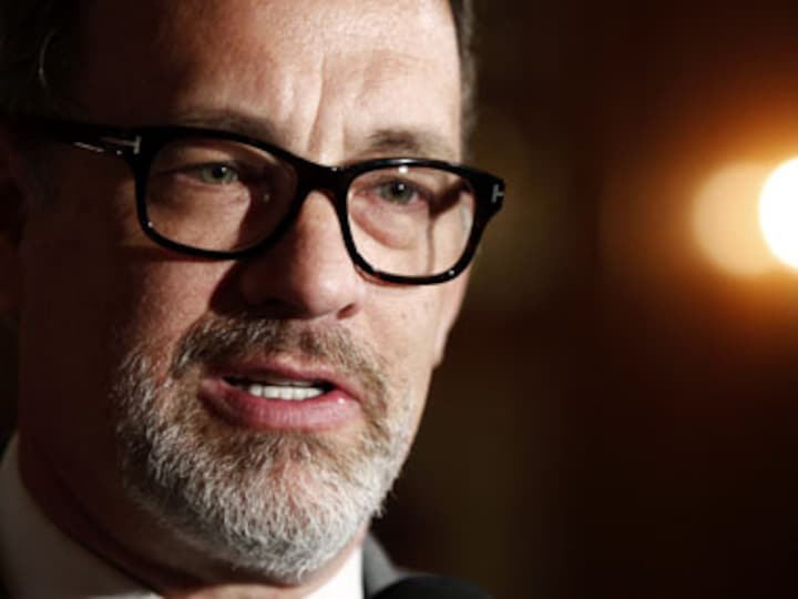 Tom Hanks says he'd love to star in a James Bond movie, but hasn't been approached for a role