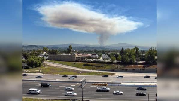 Out-of-control wildfires in California force hundreds to flee