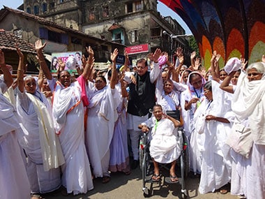 Dr Pathak with Kanak Lata in the wheelchair. Sandip Roy/Firstpost