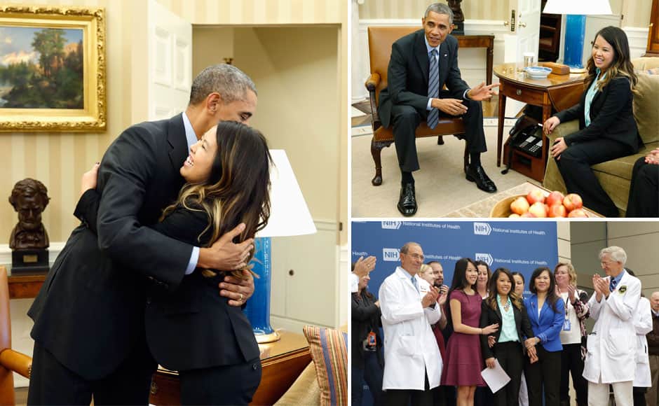 U.S. President Barack Obama hugs Dallas nurse Nina Pham at the Oval Office in Washington, October 24, 2014. Obama gave a big hug on Friday to Nina Pham, the Dallas nurse who survived a bout with Ebola. Obama met Pham in the Oval Office shortly after her release from a nearby hospital after recovering from the virus. Pham, who contracted the disease while treating a man who later died of Ebola in a Dallas hospital, had been undergoing treatment at the National Institutes of Health in Bethesda, Maryland, since Oct. 16. REUTERS