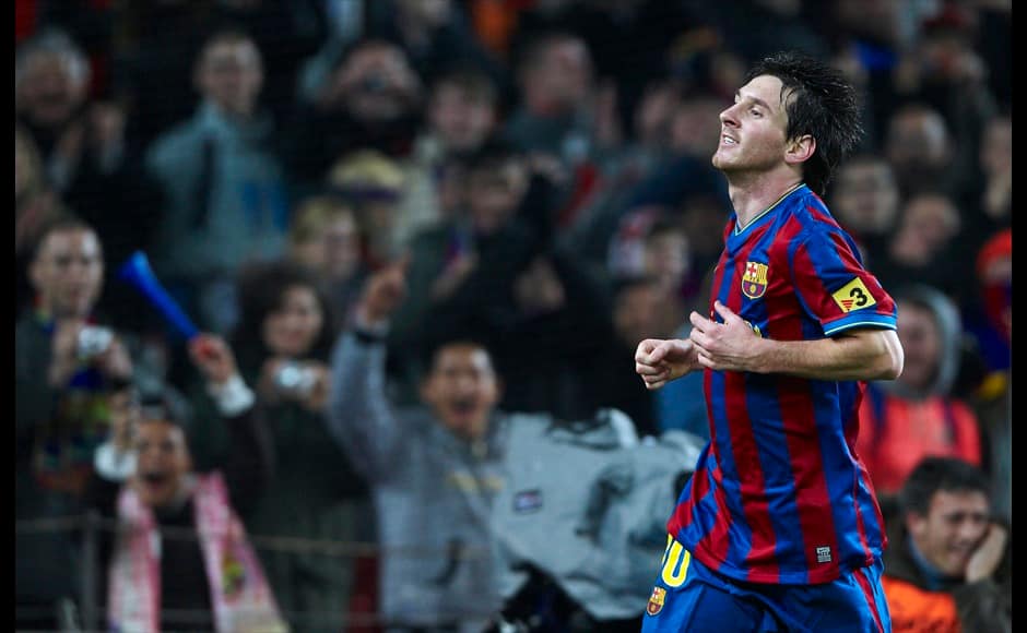 BARCELONA, SPAIN - JANUARY 16: Lionel Messi of FC Barcelona celebrates after scoring during the La Liga match between Barcelona and Sevilla at the Camp Nou stadium on January 16, 2010 in Barcelona, Spain. Barcelona won 4-0. (Photo by Manuel Queimadelos Alonso/Getty Images)